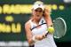 LONDON, ENGLAND - JULY 02: Agnieszka Radwanska of Poland plays a backhand during the Ladies' Singles quarter-final match against Na Li of China on day eight of the Wimbledon Lawn Tennis Championships at the All England Lawn Tennis and Croquet Club at Wimbledon on July 2, 2013 in London, England. (Photo by Dennis Grombkowski/Getty Images)