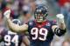 HOUSTON, TX - JANUARY 05: J.J. Watt #99 of the Houston Texans waits between plays against the Cincinnati Bengals during their AFC Wild Card Playoff Game at Reliant Stadium on January 5, 2013 in Houston, Texas. (Photo by Scott Halleran/Getty Images)