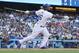 LOS ANGELES, CA - JUNE 24: Yasiel Puig #66 of the Los Angeles Dodgers hits a solo home run in the first inning during the MLB game against the San Francisco Giants at Dodger Stadium on June 24, 2013 in Los Angeles, California. (Photo by Victor Decolongon/Getty Images)