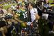 Sep 8, 2011; Green Bay, WI, USA; Green Bay Packers quarterback Aaron Rodgers (12) greets New Orleans Saints quarterback Drew Brees (9) following the game at Lambeau Field. The Packers defeated the Saints 42-34. Mandatory Credit: Jeff Hanisch-USA TODAY Sports
