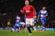 MANCHESTER, ENGLAND - MARCH 16: Wayne Rooney of Manchester United celebrates scoring the opening goal during the Barclays Premier League match between Manchester United and Reading at Old Trafford on March 16, 2013 in Manchester, England. (Photo by Michael Regan/Getty Images)