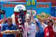 NEW YORK, NY - JULY 04: Competitive eater Joey Chestnut celebrates his victory after winning the Nathan's Famous International Hot Dog Eating Contest at Coney Island on July 4, 2012 in the Brooklyn borough of New York City. Chestnut won the men's division by successfully tying his own world record by eating 68 hot dogs in 10 minutes; he has now won the competition six years in a row. (Photo by Andrew Burton/Getty Images)