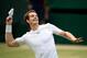 LONDON, ENGLAND - JULY 03: Andy Murray of Great Britain throws his wristband into the crowd as he celebrates match point during the Gentlemen's Singles quarter-final match against Fernando Verdasco of Spain on day nine of the Wimbledon Lawn Tennis Championships at the All England Lawn Tennis and Croquet Club at Wimbledon on July 3, 2013 in London, England. (Photo by Dennis Grombkowski/Getty Images)