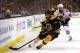 BOSTON, MA - JUNE 17: Tyler Seguin #19 of the Boston Bruins handles the puck against Patrick Sharp #10 of the Chicago Blackhawks in the first period in Game Three of the 2013 NHL Stanley Cup Final at TD Garden on June 17, 2013 in Boston, Massachusetts. (Photo by Bruce Bennett/Getty Images)
