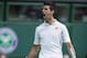 Jul 1, 2013; London, United Kingdom; Novak Djokovic (SRB) celebrates recording match point during his match against Tommy Haas (GER) on day seven of the 2013 Wimbledon Championships at the All England Lawn Tennis Club. Mandatory Credit: Susan Mullane-USA TODAY Sports