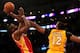 LOS ANGELES, CA - APRIL 17: James Harden #13 of the Houston Rockets shoots over Dwight Howard #12 of the Los Angeles Lakers at Staples Center on April 17, 2013 in Los Angeles, California. The Lakers won 99-95 in overtime. NOTE TO USER: User expressly acknowledges and agrees that, by downloading and or using this photograph, User is consenting to the terms and conditions of the Getty Images License Agreement. (Photo by Stephen Dunn/Getty Images)