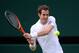 LONDON, ENGLAND - JULY 03: Andy Murray of Great Britain plays a backhand during the Gentlemen's Singles quarter-final match against Fernando Verdasco of Spain on day nine of the Wimbledon Lawn Tennis Championships at the All England Lawn Tennis and Croquet Club at Wimbledon on July 3, 2013 in London, England. (Photo by Dennis Grombkowski/Getty Images)