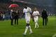 BASEL, ENGLAND - APRIL 11: Dejected Spurs teammates Emmanuel Adebayor (L) and Benoit Assou-Ekotto walk off the pitch following their team's defeat in the penalty shoot out during UEFA Europa League quarter final second leg match between FC Basel 1893 and Tottenham Hotspur at Stadion St. Jakob-Park on April 11, 2013 in Basel, Switzerland. (Photo by Julian Finney/Getty Images)