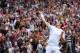 LONDON, ENGLAND - JULY 03: Andy Murray of Great Britain throws his wristband into the crowd as he celebrates match point during the Gentlemen's Singles quarter-final match against Fernando Verdasco of Spain on day nine of the Wimbledon Lawn Tennis Championships at the All England Lawn Tennis and Croquet Club at Wimbledon on July 3, 2013 in London, England. (Photo by Clive Brunskill/Getty Images)
