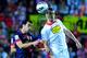 SEVILLE, SPAIN - SEPTEMBER 29: Alvaro Negredo of Sevilla FC saves on a header of Sergio Busquets of FC Barcelona during the La Liga match between Sevilla FC and FC Barcelona at Estadio Ramon Sanchez Pizjuan on September 29, 2012 in Seville, Spain. (Photo by Gonzalo Arroyo Moreno/Getty Images)