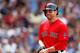 BOSTON, MA - JUNE 8: Jacoby Ellsbury #2 of the Boston Red Sox smiles after scoring a run against the Los Angeles Angels of Anaheim leaps for a high throw in the 4th inning during the first game of a doubleheader at Fenway Park on June 8, 2013 in Boston, Massachusetts. (Photo by Jim Rogash/Getty Images)