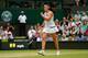 LONDON, ENGLAND - JULY 04: Marion Bartoli of France celebrates a point during the Ladies Singles semi final match against Kirsten Flipkens of Belgium on day ten of the Wimbledon Lawn Tennis Championships at the All England Lawn Tennis and Croquet Club on July 4, 2013 in London, England. (Photo by Mike Hewitt/Getty Images)