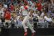 SAN DIEGO, CA - JUNE 25: Domonic Brown #9 of the Philadelphia Phillies looks skyward after hitting a three-run homer during the third inning of a baseball game against the San Diego Padres at Petco Park on June 25, 2013 in San Diego, California. (Photo by Denis Poroy/Getty Images)