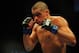 Jul 21, 2012; Calgary, AB, CANADA; Renan Barao during the interim bantamweight title bout of UFC 149 against Urijah Faber (not pictured) at the Scotiabank Saddledome. Mandatory Credit: Anne-Marie Sorvin-USA TODAY Sports