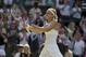 Jul 4, 2013; London, United Kingdom; Sabine Lisicki (GER) celebrates recording match point during her match against Agnieszka Radwanska (POL) on day 10 of the 2013 Wimbledon Championships at the All England Lawn Tennis Club. Mandatory Credit: Susan Mullane-USA TODAY Sports