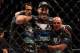 July 11, 2012; San Jose, CA, USA; Chris Weidman (center) celebrates with his team after defeating Mark Munoz (not pictured) in the middleweight bout of the UFC on Fuel TV at HP Pavilion. Mandatory Credit: Kyle Terada-USA TODAY Sports