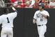 Jun 9, 2013; Raleigh, NC, USA; Rice Owls Michael Aquino celebrates with teammates after hitting a home run against the North Carolina State Wolfpack during the Raleigh super regional of the 2013 NCAA baseball tournament at Doak Field. Mandatory Credit: Jeremy Brevard-USA TODAY Sports