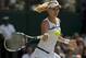 Jul 4, 2013; London, United Kingdom; Agnieszka Radwanska (POL) during her match against Sabine Lisicki (GER) on day 10 of the 2013 Wimbledon Championships at the All England Lawn Tennis Club. Mandatory Credit: Susan Mullane-USA TODAY Sports