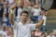 Jul 3, 2013; London, United Kingdom; Novak Djokovic (SRB) celebrates recording match point during his match against Tomas Berdych (CZE) on day nine of the 2013 Wimbledon Championships at the All England Lawn Tennis Club. Mandatory Credit: Susan Mullane-USA TODAY Sports