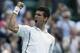 Jul 1, 2013; London, United Kingdom; Novak Djokovic (SRB) celebrates recording match point during his match against Tommy Haas (GER) (not pictured) on day seven of the 2013 Wimbledon Championships at the All England Lawn Tennis Club. Mandatory Credit: Susan Mullane-USA TODAY Sports