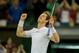Jul 5, 2013; London, United Kingdom; Andy Murray (GBR) celebrates recording match point during his match against Jerzy Janowicz (POL) (not pictured) on day 11 of the 2013 Wimbledon Championships at the All England Lawn Tennis Club. Murray won 6-7, (2-7), 6-4, 6-4, 6-3. Mandatory Credit: Susan Mullane-USA TODAY Sports