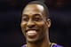 SAN ANTONIO, TX - APRIL 21: Dwight Howard #12 of the Los Angeles Lakers smiles during Game One of the Western Conference Quarterfinals of the 2013 NBA Playoffs at at AT&T Center on April 21, 2013 in San Antonio, Texas. NOTE TO USER: User expressly acknowledges and agrees that, by downloading and or using this photograph, User is consenting to the terms and conditions of the Getty Images License Agreement. (Photo by Ronald Martinez/Getty Images)