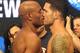 Jul 5, 2013; Las Vegas, NV, USA; Anderson Silva (left) faces off with Chris Weidman at today's weighs-in for their UFC fight at the Mandalay Bay Event Center. Silva takes on Weidman at the MGM Grand Garden Arena July 6. Mandatory Credit: Jayne Kamin-Oncea-USA TODAY Sports