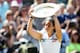 Marion Bartoli raises the Wimbledon Ladies Trophy
