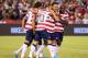 SAN DIEGO, CA - JULY 05: (L-R) Mix Diskerud #8, Landon Donovan #10, Herculez Gomez #9 and DaMarcus Beasley #7 of the USA celebrate Donovan's goal against Guatemala in the second half at Qualcomm Stadium on July 5, 2013 in San Diego, California. The USA defeated Guatemala 6-0. (Photo by Jeff Gross/Getty Images)