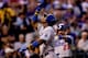 DENVER, CO - JULY 2: Yasiel Puig #66 of the Los Angeles Dodgers points to the sky to celebrate his solo home run during the seventh inning against the Colorado Rockies at Coors Field on July 2, 2013 in Denver, Colorado. The Dodgers defeated the Rockies 8-0. (Photo by Justin Edmonds/Getty Images)