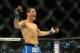 Jul 6, 2013; Las Vegas, NV, USA; Chris Weidman celebrates after defeating Anderson Silva in their Middleweight Chamionship Bout in the second round with a TKO at the MGM Grand Garden Arena. Mandatory Credit: Jayne Kamin-Oncea-USA TODAY Sports