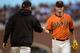 SAN FRANCISCO, CA - JULY 05: Manager Bruce Bochy #15 (L) of the San Francisco Giants takes the ball from pitcher Matt Cain #18 (R) taking Cain out of the game in the third inning against the Los Angeles Dodgers at AT&T Park on July 5, 2013 in San Francisco, California. (Photo by Thearon W. Henderson/Getty Images)