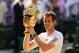 LONDON, ENGLAND - JULY 07: Andy Murray of Great Britain poses with the Gentlemen's Singles Trophy following his victory in the Gentlemen's Singles Final match against Novak Djokovic of Serbia on day thirteen of the Wimbledon Lawn Tennis Championships at the All England Lawn Tennis and Croquet Club on July 7, 2013 in London, England. (Photo by Julian Finney/Getty Images)
