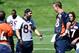 May 30, 2013; Englewood, CO, USA; Denver Broncos quarterback Peyton Manning (18) and wide receiver Wes Welker (83) talk during organized team activities at the Broncos training facility. Mandatory Credit: Ron Chenoy-USA TODAY Sport