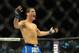 Jul 6, 2013; Las Vegas, NV, USA; Chris Weidman celebrates after defeating Anderson Silva in their Middleweight Chamionship Bout in the second round with a TKO at the MGM Grand Garden Arena. Mandatory Credit: Jayne Kamin-Oncea-USA TODAY Sports