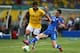 SALVADOR, BRAZIL - JUNE 22: Hulk of Brazil competes with Mattia De Sciglio of Italy during the FIFA Confederations Cup Brazil 2013 Group A match between Italy and Brazil at Estadio Octavio Mangabeira (Arena Fonte Nova Salvador) on June 22, 2013 in Salvador, Brazil. (Photo by Clive Mason/Getty Images)