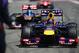 NUERBURG, GERMANY - JULY 07: Sebastian Vettel of Germany and Infiniti Red Bull Racing arrives on the grid before the German Grand Prix at the Nuerburgring on July 7, 2013 in Nuerburg, Germany. (Photo by Paul Gilham/Getty Images)