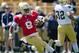 Apr 20, 2013; Notre Dame, IN, USA; Notre Dame Fighting Irish quarterback Malik Zaire (8) slides in the third quarter of the Blue-Gold Game at Notre Dame Stadium. Mandatory Credit: Matt Cashore-USA TODAY Sports