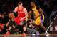 LOS ANGELES, CA - APRIL 17: Omer Asik #3 of the Houston Rockets controls the ball against Dwight Howard #12 of the Los Angeles Lakers at Staples Center on April 17, 2013 in Los Angeles, California. NOTE TO USER: User expressly acknowledges and agrees that, by downloading and or using this photograph, User is consenting to the terms and conditions of the Getty Images License Agreement. (Photo by Stephen Dunn/Getty Images)