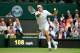 LONDON, ENGLAND - JUNE 26: Roger Federer of Switzerland plays a forehand during his Gentlemen's Singles second round match against Sergiy Stakhovsky of Ukraine on day three of the Wimbledon Lawn Tennis Championships at the All England Lawn Tennis and Croquet Club on June 26, 2013 in London, England. (Photo by Mike Hewitt/Getty Images)