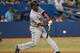 TORONTO, CANADA - JULY 4: Torii Hunter #48 of the Detroit Tigers hits a single in the eighth inning during MLB game action against the Toronto Blue Jays on July 4, 2013 at Rogers Centre in Toronto, Ontario, Canada. (Photo by Tom Szczerbowski/Getty Images)