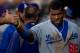 DENVER, CO - JULY 2: Yasiel Puig #66 of the Los Angeles Dodgers celebrates in the dugout after scoring during the third inning against the Colorado Rockies at Coors Field on July 2, 2013 in Denver, Colorado. The Dodgers defeated the Rockies 8-0. (Photo by Justin Edmonds/Getty Images)