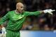 MILAN, ITALY - NOVEMBER 06: Goalkeeper Wilfredo Caballero of Malaga CF signals during the UEFA Champions League group C match between AC Milan and Malaga CF at Stadio Giuseppe Meazza on November 6, 2012 in Milan, Italy. (Photo by Claudio Villa/Getty Images)