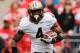 COLUMBUS, OH - OCTOBER 23: O.J. Ross #4 of the Purdue Boilermakers runs with the ball against the Ohio State Buckeyes at Ohio Stadium on October 23, 2010 in Columbus, Ohio. (Photo by Jamie Sabau/Getty Images)