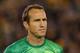 MELBOURNE, AUSTRALIA - JUNE 11: Mark Schwarzer of the Socceroos stands for the National Anthem before the FIFA World Cup Qualifier match between the Australian Socceroos and Jordan at Etihad Stadium on June 11, 2013 in Melbourne, Australia. (Photo by Michael Dodge/Getty Images)