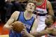 WASHINGTON, DC - JANUARY 25: A.J. Price #12 of the Washington Wizards fouls Andrei Kirilenko #47 of the Minnesota Timberwolves during the first half at Verizon Center on January 25, 2013 in Washington, DC. NOTE TO USER: User expressly acknowledges and agrees that, by downloading and or using this photograph, User is consenting to the terms and conditions of the Getty Images License Agreement. (Photo by Rob Carr/Getty Images)