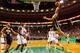 BOSTON, MA - JANUARY 4: Tyler Hansbrough #50 of the Indiana Pacers dunks the ball in front of Brandon Bass #30 of the Boston Celtics during the game on January 4, 2013 at TD Garden in Boston, Massachusetts. NOTE TO USER: User expressly acknowledges and agrees that, by downloading and or using this photograph, User is consenting to the terms and conditions of the Getty Images License Agreement. (Photo by Jared Wickerham/Getty Images)