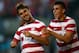 PORTLAND, OR - JULY 09: Chris Wondolowski #19 of the United States celebrates scoring his third goal in the first half against Belize with teammate Joe Corona #6 during the 2013 CONCACAF Gold Cup on July 9, 2013 at Jeld-Wen Field in Portland, Oregon. (Photo by Jonathan Ferrey/Getty Images)
