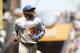Jul 7, 2013; San Francisco, CA, USA; Los Angeles Dodgers outfielder Yasiel Puig (66) jogs towards the dugout after being called out after attempting to steal third base against the San Francisco Giants in the fourth inning at AT&T Park. Mandatory Credit: Cary Edmondson-USA TODAY Sports