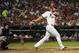 Jul 9, 2013; St. Louis, MO, USA; St. Louis Cardinals second baseman Matt Carpenter (13) hits a two run double off of Houston Astros starting pitcher Bud Norris (not pictured) during the fourth inning at Busch Stadium. Mandatory Credit: Jeff Curry-USA TODAY Sports